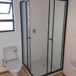 Various design and customization options for Nutec houses, including different layouts and finishes like in this bathroom